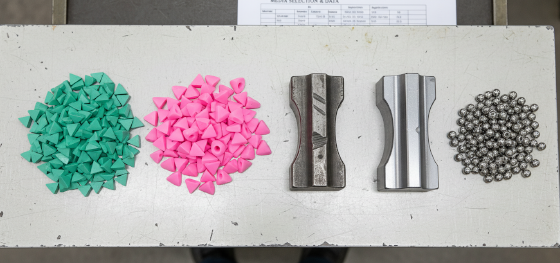 comparing ceramic and plastic abrasive media for custom metallurgy
