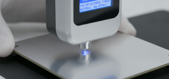 Advanced XRF scanner verifying the exact microscopic thickness of a silver metallic coating