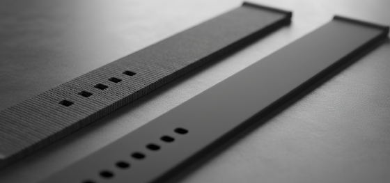 Texture comparison between rough FDM extruded layer lines and uniform matte laser sintered watch straps Texture comparison between rough FDM extruded layer lines and uniform matte laser sintered watch straps